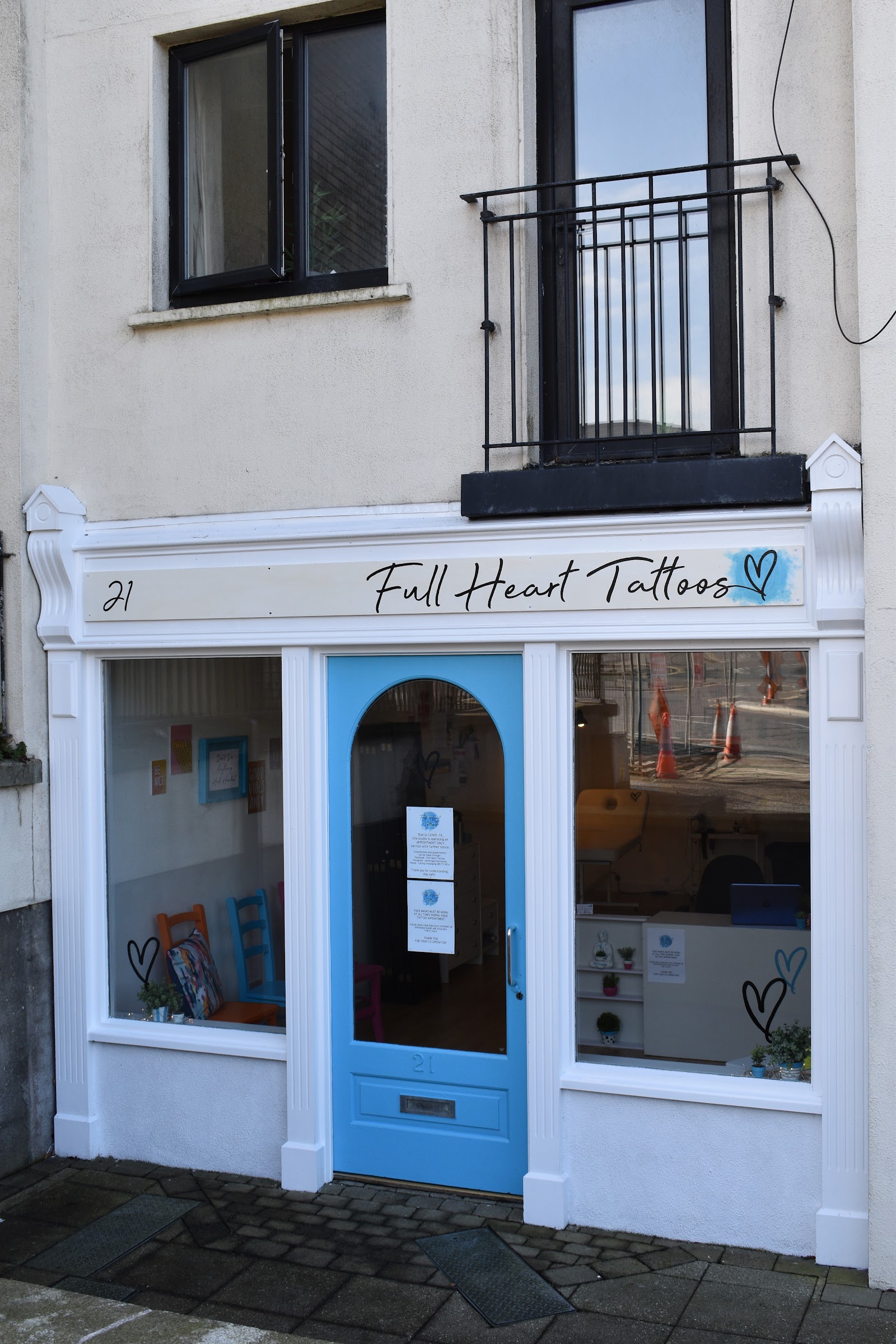 The Full Heart Tattoos shopfront at 21 Auburn Court, Market Square, Longford — sky-blue door and script sign